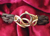 Bracelet with twist clasp