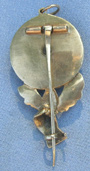 Hand brooch back